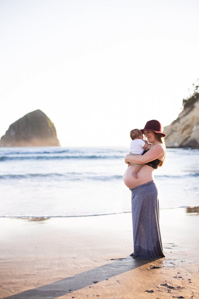 maternity photo shoot at the beach holding baby maternity photo shoot at the beach holding baby