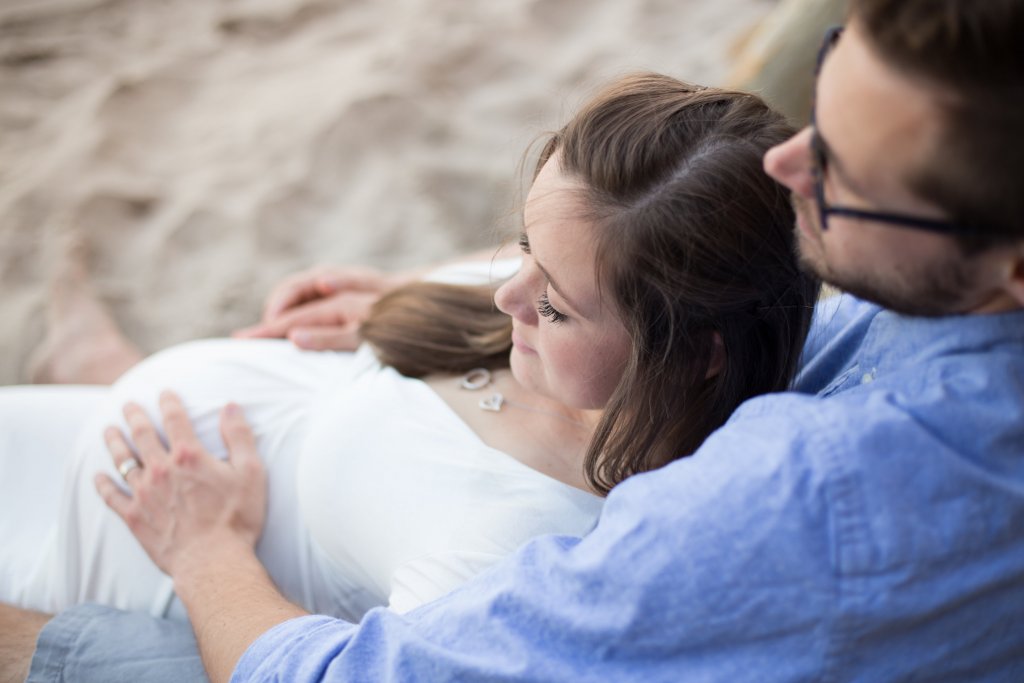 maternity photo shoot at the beach laying down maternity photo shoot at the beach laying down