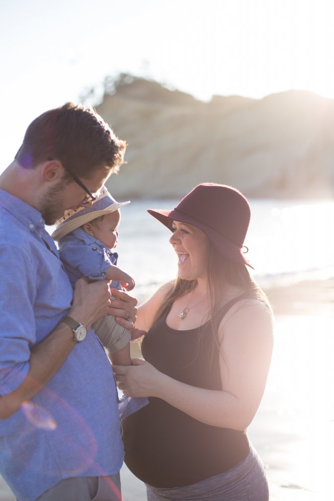 maternity photo shoot at the beach wearing hats maternity photo shoot at the beach wearing hats