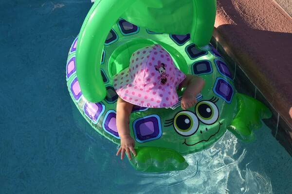 A toddler in a pool